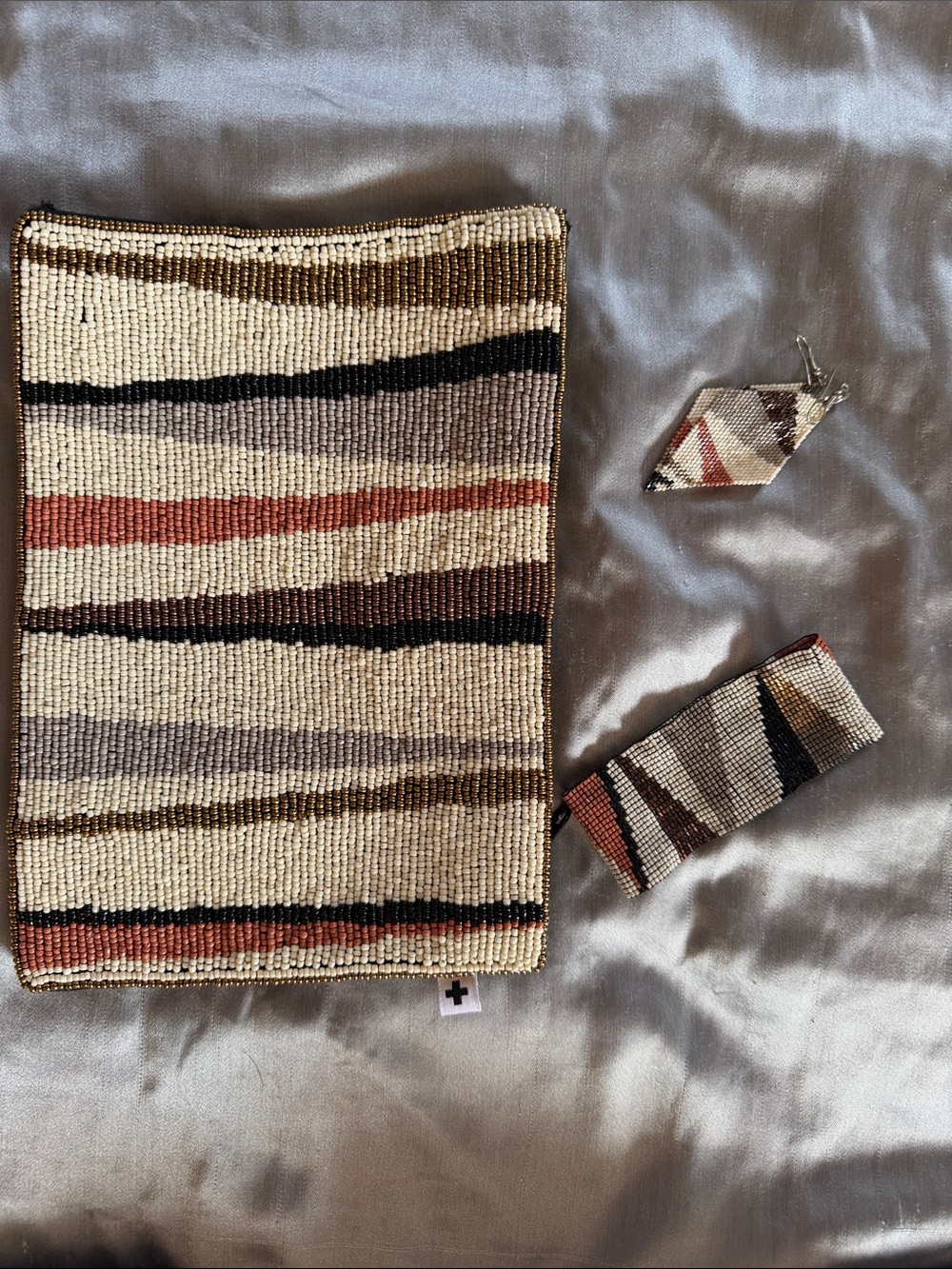 Clutch, earrings and bracelet